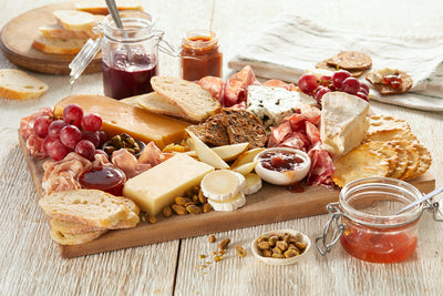 Cheese and Charcuterie Board with Galloping Cows Cranberry Marmalade and Brandy Spread