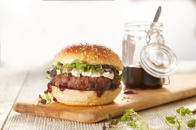 Grilled Beef Burgers with Goat Cheese, Arugula and Galloping Cows Wild Blueberry Pepper Jelly